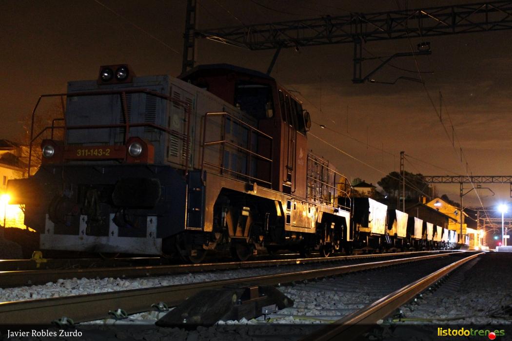 311.143 con tren de Balasto 