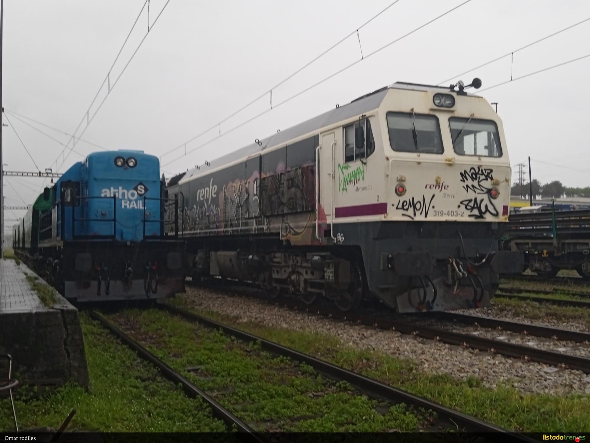 319-403 al lado de la 308 Athos rail