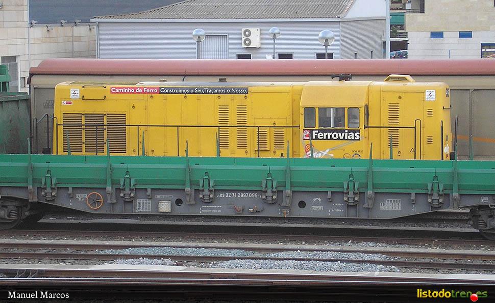 308003